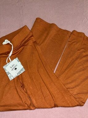 kate quinn orange/rust-colored bamboo flare pants